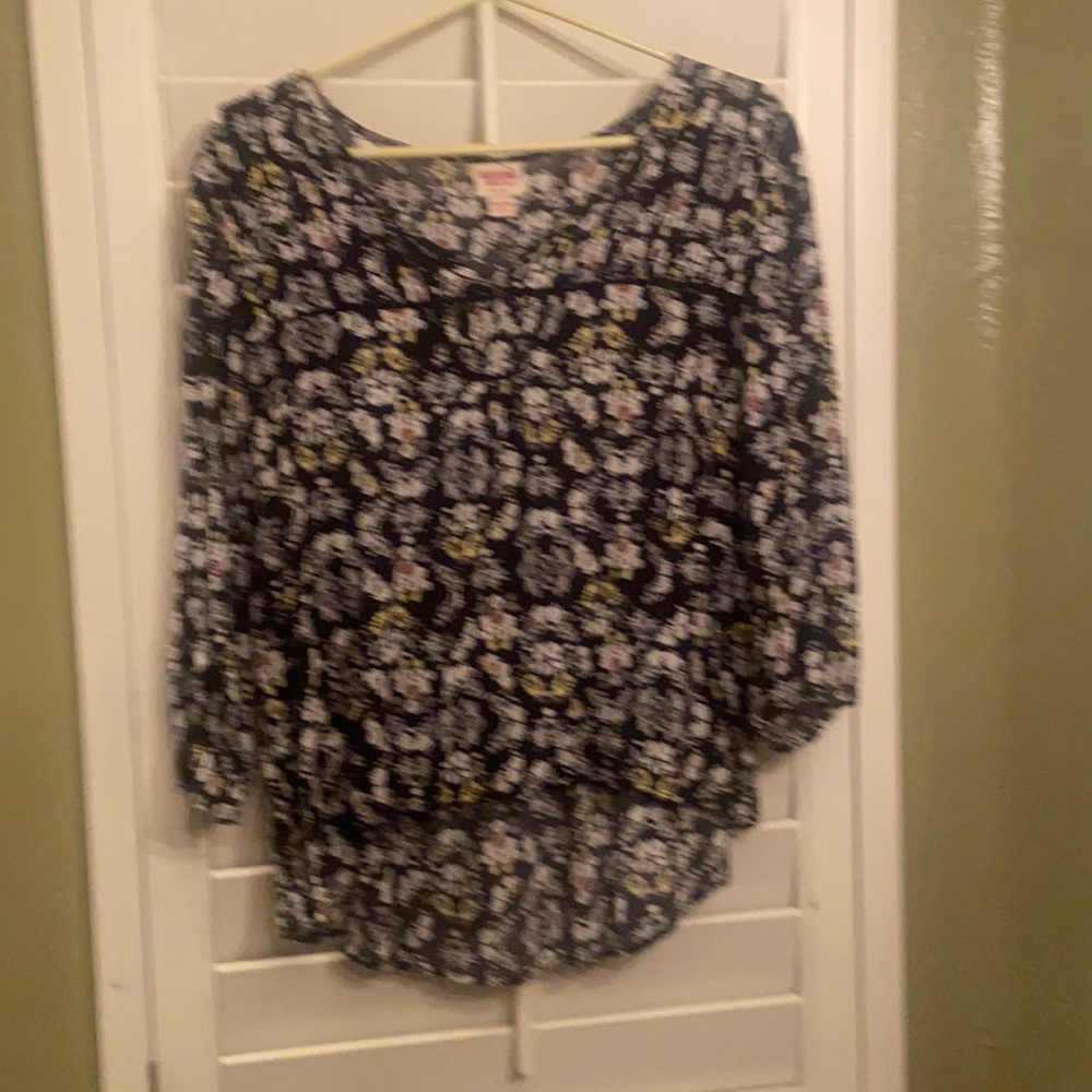 Flower print on black blouse